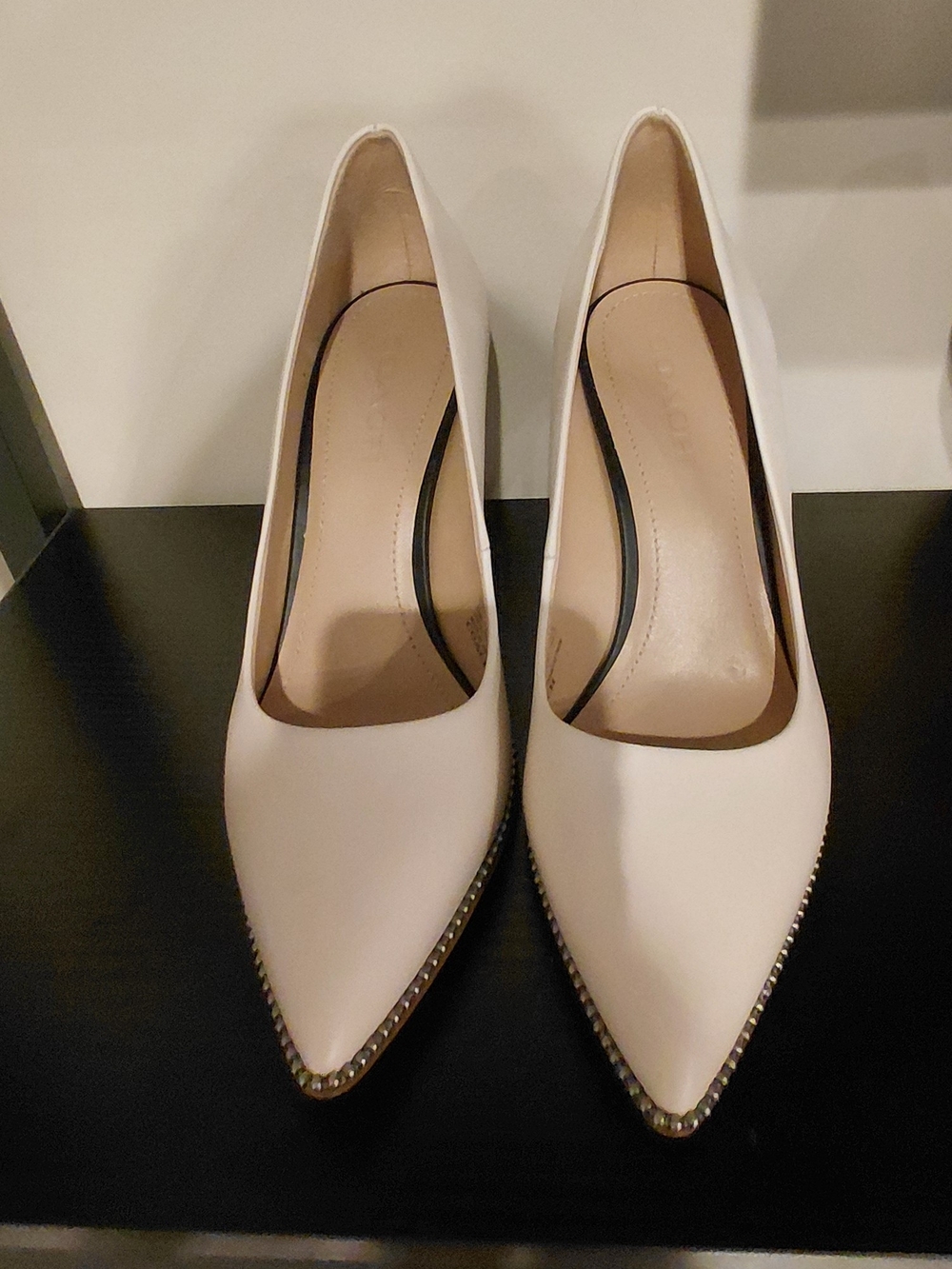 Coach Women's Pointed-Toe Pumps in Off White with Stud Trim